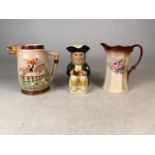 Three ceramic jugs, to include Keele Street Pottery fox hunting, Toby Wood Philpot and an unmarked