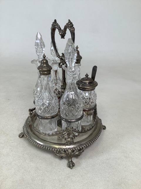 Victorian revolving EPNS condiment set comprising cut glass bottles, a mustard bottle with lid and - Image 2 of 4