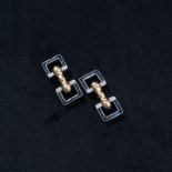 A pair of early 20th century French 18ct gold platinum and sapphire set gentlemans cuff links with