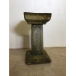 A reconstituted stone three piece bird bath.W:22cm x D:22cm x H:43cm