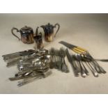 A large collection of silver plated items.