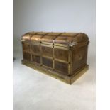A faux leather and metal framed trunk. W:74cm x D:35.5cm x H:40cm