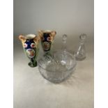 Two Victorian vases (AF) with two glass decanters and a large punch bowl. Chips to the vases and