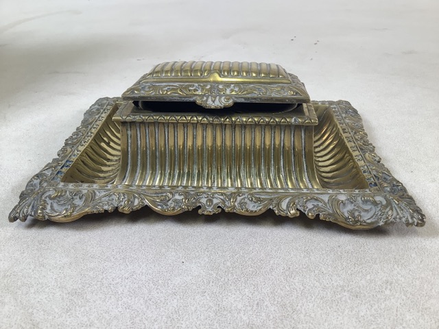 A Victorian brass desk top inkwell W:22cm x D:17cm x H:8cm