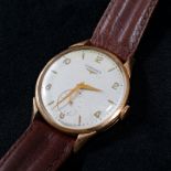 LONGINES. A gentlemans 18ct. gold cased Longines wristwatch, the cream dial with arrowhead and