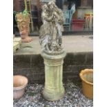 Reconstituted stone statue of two figures on reconstituted stone column. W:35cm x D:35cm x H: