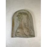 An arched top reconstituted stone relief bust of a lady.W:34cm x D:6cm x H:46cm