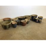 A large quantity of ceramic and glazed garden pots.