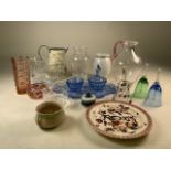 A collection of 20th century Coloured glassware, glass bells and other items.