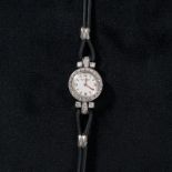 A Jaeger - Le Coultre 18ct white gold and diamond set lady's cocktail wristwatch, circular 14mm