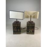 A pair of Chinoiserie tea tin canister table lamps with half shade. Tins stamped made in England.