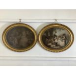 Two coloured etchings in ornate oval gilt frames.