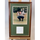 A framed picture of golfer Nick Faldo and a signed scoring sheet. W:30.5cm x H:49cm