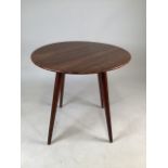 A mid century Ercol style circular teak coffee table. W:56cm x D:56cm x H:53cm