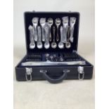 A Suissine cased canteen of cutlery, 12 place settings. Stainless steel cutlery with gold coloured