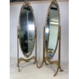A pair of mid century gilt cheval mirrors with bevel edge.W:48cm x H:161cm