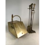 A brass coal scuttle with lid and shovel together with a brass fireside companion. Companion height: