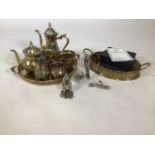 A collection of brassware to include trays, coffee pot and teapot and other items. Together with