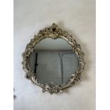 A gilt framed mirror. W:51cm x D:4cm x H:60cm