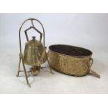 An arts and crafts brass jardiniere also with a brass kettle on stand.W:35cm x D:23cm x H:15cm