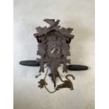 An early 20th century Black Forest cuckoo clock with weightsW:23cm x D:26cm x H:41cm