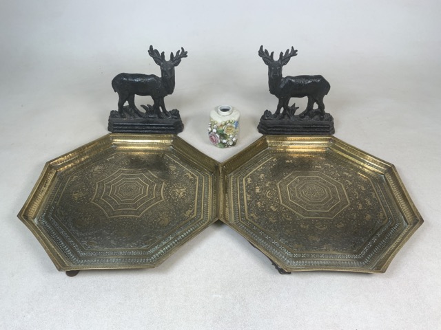 A pair of Islamic style wall plaques together with a pair of cast metal stags and a small ceramic