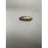 A 9ct gold and multi gem set ring. 1.7g Size Q.