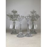 A pair of lead crystal candlesticks. Height: 25cm, together with pair of early twentieth century