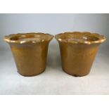 A Pair of glazed ceramic planters.W:45cm x D:45cm x H:35cm