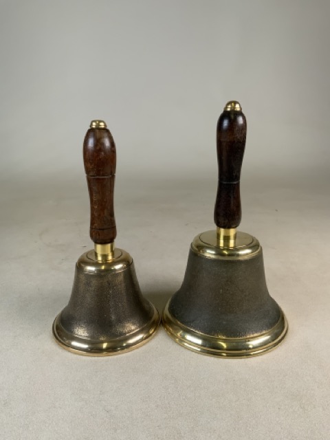 Two brass bell with oak handles.W:15cm x D:15cm x H:25cm