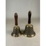 Two brass bell with oak handles.W:15cm x D:15cm x H:25cm