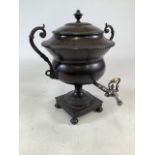 A Regency style Russian bronze Samovar. Silver plated and bone tap to square base raised on squashed