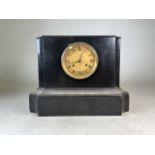 A slate eight day mantle clock. W:38.5cm x D:20cm x H:29cm