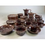 A Kernewek pottery Goodhavern Cornwall, coffee pot set with various plates and bowls.