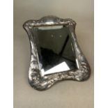 A sterling silver dressing table mirror with stylised art nouveau by Keyford Frames LTD