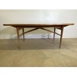 A 1960s Robert Heritage for Archie Shine a wishbone extending rosewood and teak dining table with