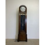 An Arts and Crafts style oak domed top longcase clock. Three weights and a pendulum.W:46cm x D: