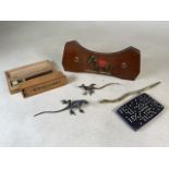 An assortment of small items to include three metal animal, dominoes sets, fountain pen tips and