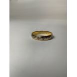 An 18ct white and yellow gold gentlemans wedding band 4.4g