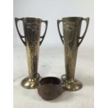 A pair of Arts and crafts brass spill vases together with a secessionist style copper and brass