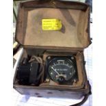 A British World War II radio calibration device in leather carry case with broad arrow stamp 50/