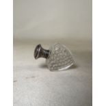 A sterling silver topped shield shaped glass scent bottle by Selfridge & Co Ltd, Birmingham