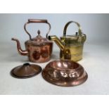 Copper kettle and a brass water jug with two other copper items.H:26cm