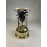 A brass Tilley lamp.H:32cm