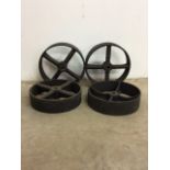 Four cast iron wheels. Diameter 30cm. Depth of rim 8cm