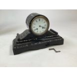 Japy Frere, Paris a slate and marble mantle clock enamel face with Roman numeral markers. W: