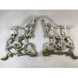 A pair of Coalbrookdale Victorian dog and vine bench ends.