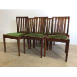 A set of six Meredew mid century teak dining chairs with green upholstery draylon seats. W:49cm