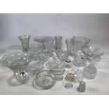A large collection of cut and pressed glass with some crystal