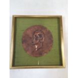 A framed copper work silhouette signed O Ashmore, Frame dimensions:W:22cm x D:2.5cm x H:22.5cm